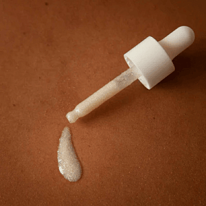 SLOW SEX Bijoux Indiscrets Hair and Skin Shimmer Dry Oil — масло с шиммером для тела и волос 